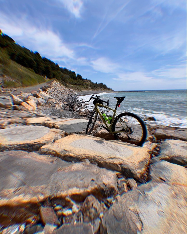 Coastal road with cyclist